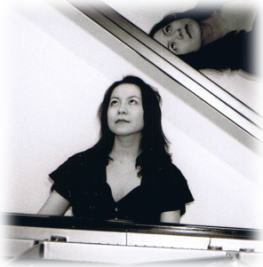 高梨智子（写真）